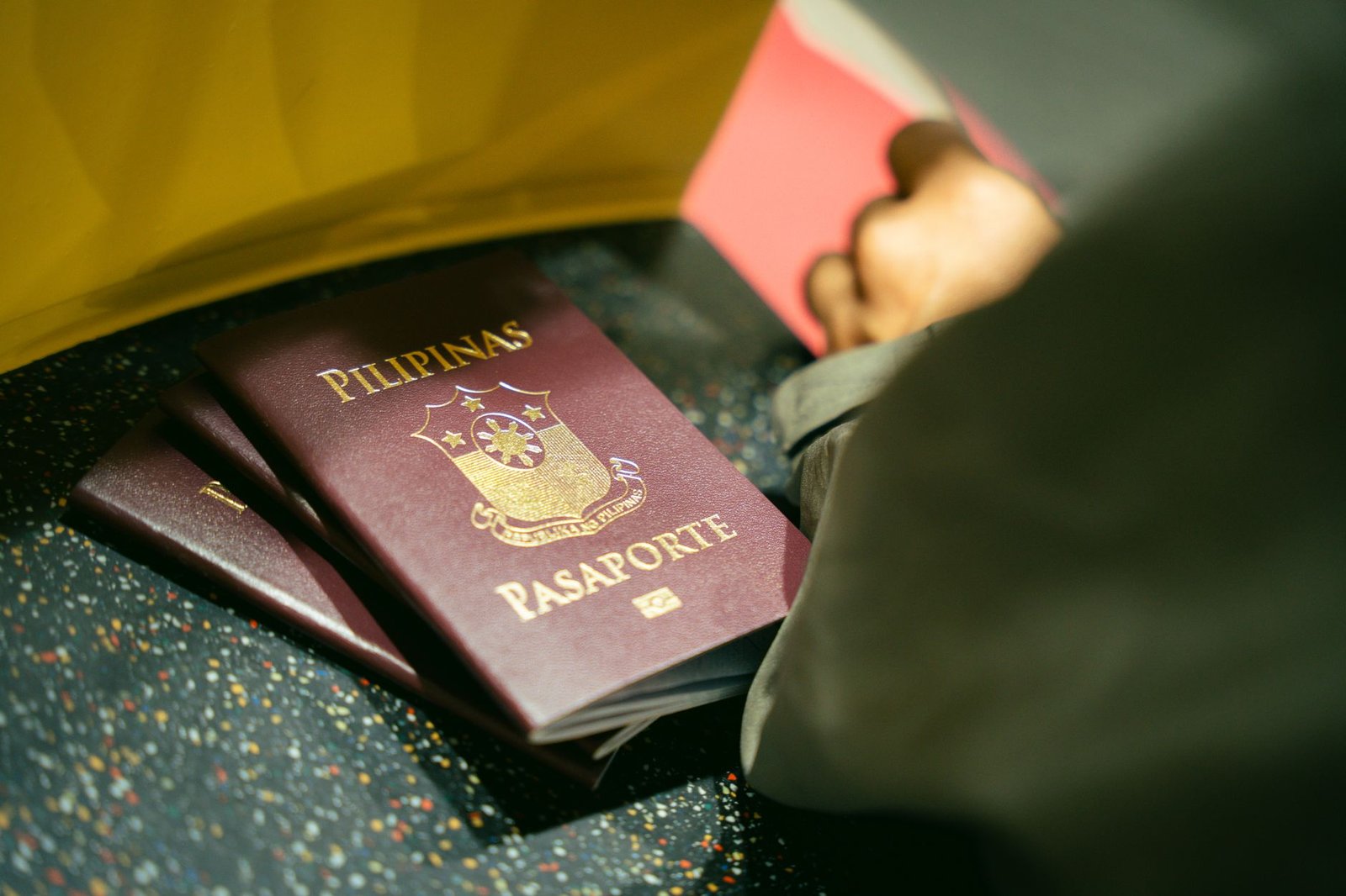 Close-up of a passport at the airport, representing UAE visa and absconding status checks