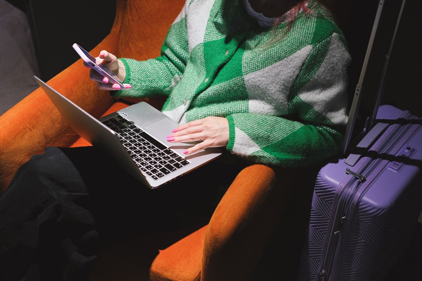 Person working remotely on a laptop representing the UAE Virtual Working Programme remote work visa