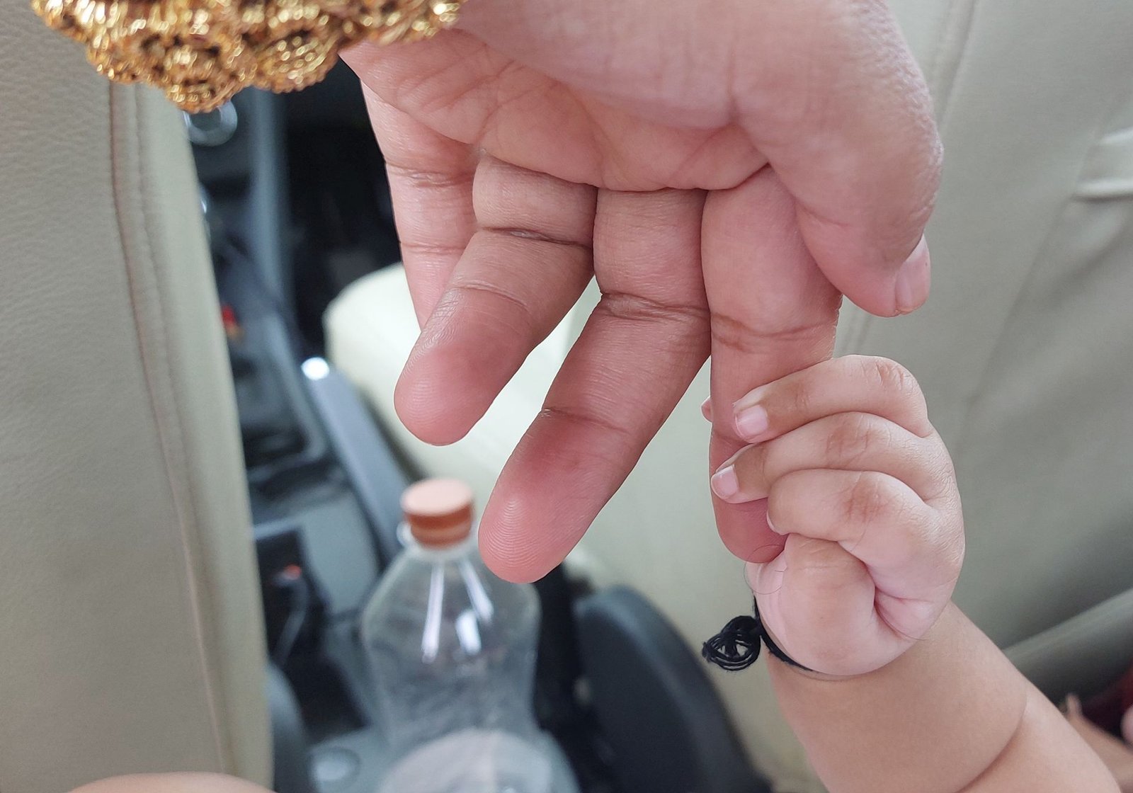 Parent and child holding hands, representing child custody and guardianship for expats in Dubai