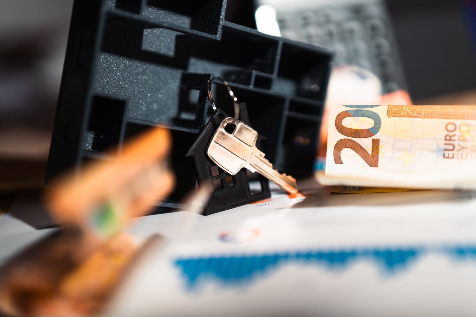 Tenant reviewing a Dubai rental lease and keys, representing RERA rental index rent increase rules and tenant dispute rights