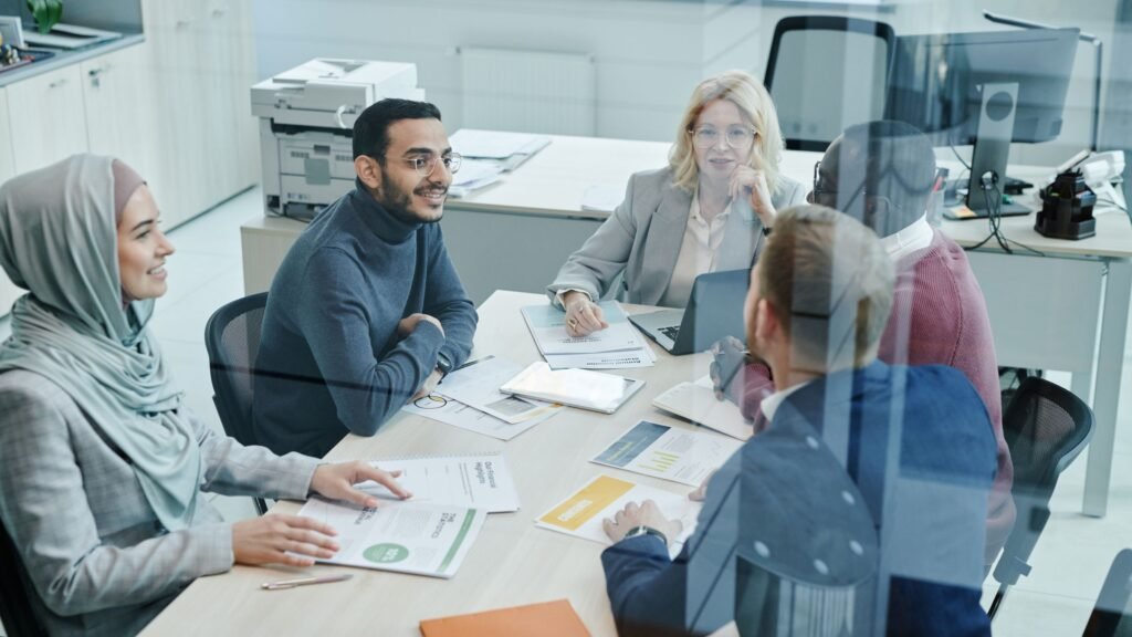 UAE business team in an office reflecting private sector Emiratisation hiring