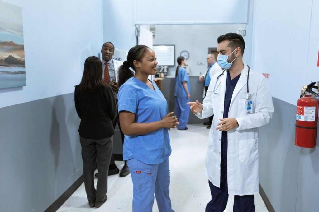 Medical practitioners discussing a case, representing UAE Golden Visa for doctors and healthcare professionals