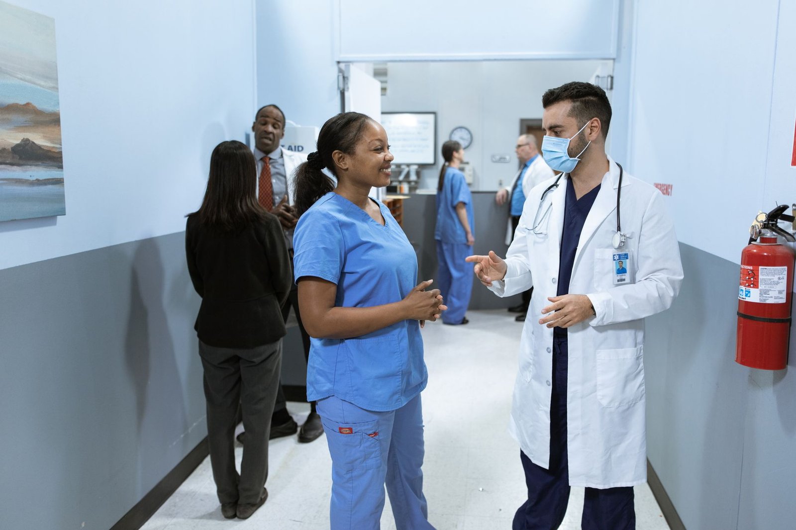 Medical practitioners discussing a case, representing UAE Golden Visa for doctors and healthcare professionals